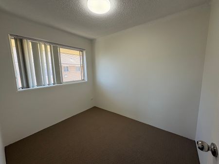 PEACEFUL 3 BEDROOM UNIT WITH LOCK UP GARAGE - Photo 2