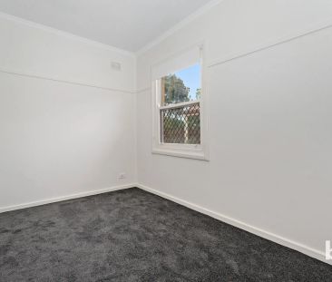 Modern & Charming 3-Bedroom - Photo 3