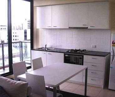 Furnished 2-Bedroom Apartment in Prime Melbourne CBD Location - Photo 1