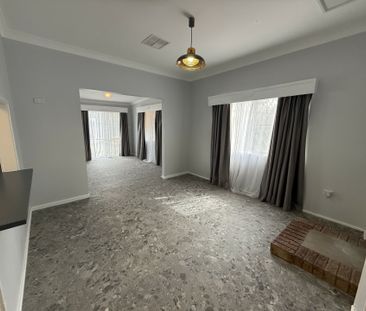 Spacious 4-Bedroom Home - Photo 1