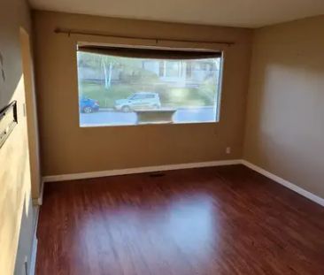 Beautiful 2 Bedroom hardwood floor Main level | 4706 Greenhill Cres... - Photo 1