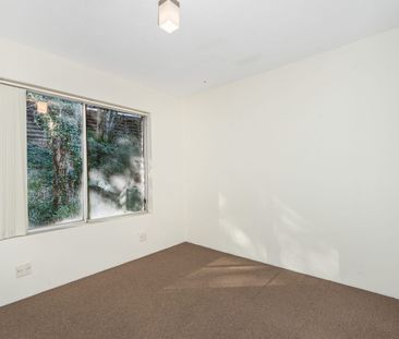 Light filled apartment at back of complex - Photo 5