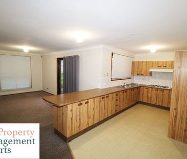 Charming 3-Bedroom Home with Spacious Living and Family-Friendly Fe... - Photo 3