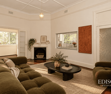 Character Home with Flexible Living Spaces and Generous Parking - Photo 1