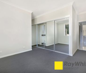 Spacious 4-Bedroom House in Riverstone - Photo 4