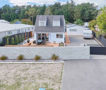 Modern Beachside Living - 3-Bedroom Home in Waikuku Beach - Photo 3