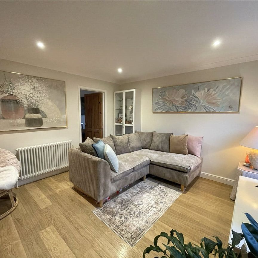 A beautifully presented unfurnished two bedroom terraced house on the outskirts of Marlborough with stunning views of the surrounding North Wessex Downs. - Photo 1