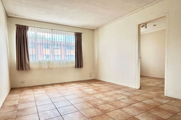 City Access, Suburban Comfort - 2 Bedroom Gem! - Photo 1