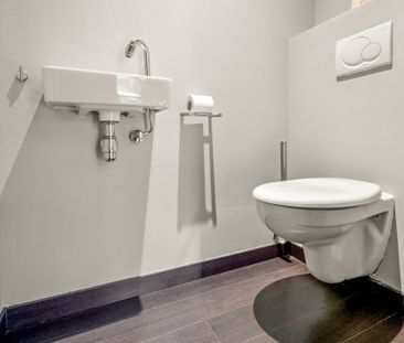 Leuk appartement met 1 slaapkamer, terras en autostaanplaats. - Foto 1