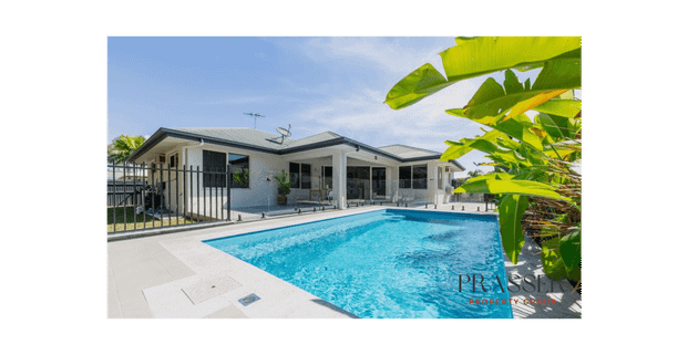 Family Home with a Sparkling Pool in Bushland Beach! - Photo 1