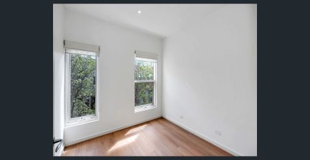 Stylish Townhouse Living in the Heart of Norwood - Photo 4