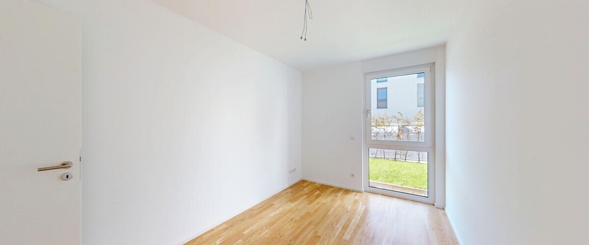 Neubau-Erstbezug: Attraktive Wohnung mit kleinem Garten und sonnigem Balkon! - Foto 1