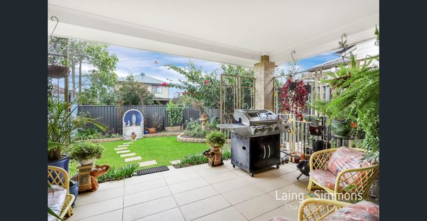 Beautiful and Well Maintained Family Home in an Ideal Location! - Photo 1