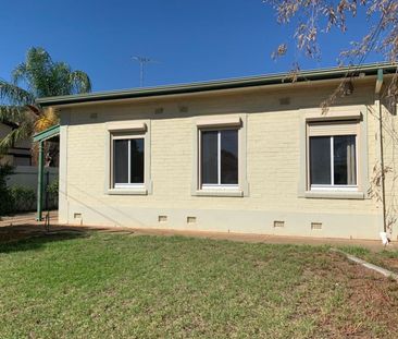 Neat, Low Maintenance Living - Photo 1