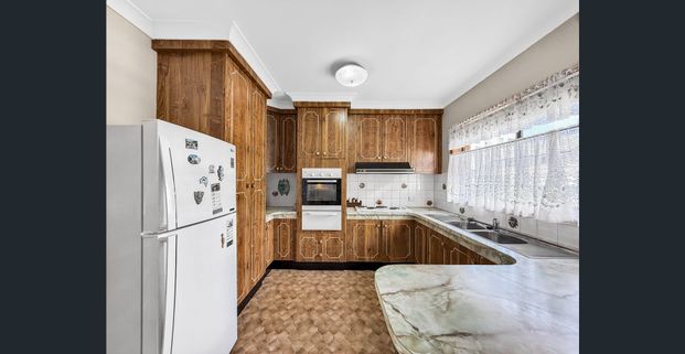 Spacious Family Home with Multiple Living Areas - Photo 1