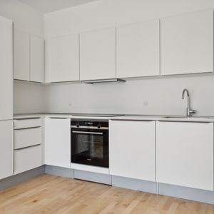 Moderne lejlighed med fantastisk beliggenhed - Photo 2