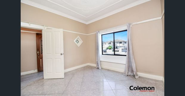 Spacious Full Brick Home with Updated Kitchen & Leveled Yard - Photo 1