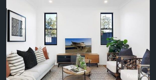 Spacious 4-Bedroom Townhouse in a Quiet Complex! - Photo 1