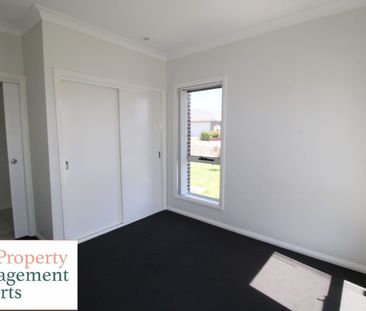 Spacious Four-Bedroom Family Home in a Prime Location! - Photo 3