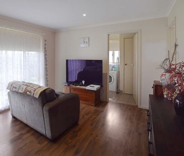 Neat Family Home - Photo 1