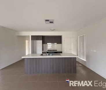 “Spacious, Stylish & Perfectly Located Family Home” - Photo 2