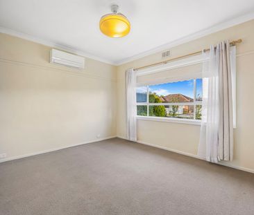 Neat as a Pin in Prime Alfredton Location - Photo 1