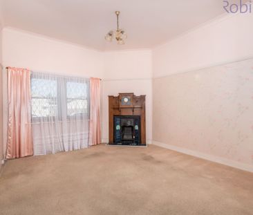 Three bedroom home with retro features. Pets considered! - Photo 6