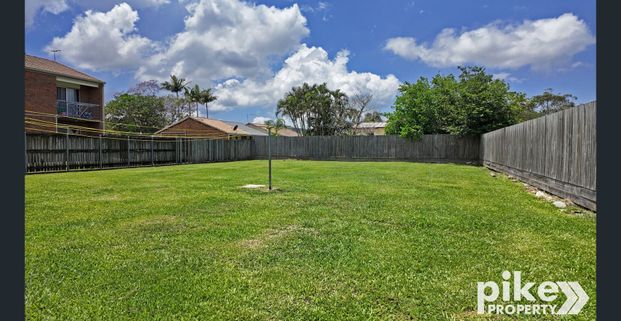 High-Set Home with Large Backyard - Photo 1