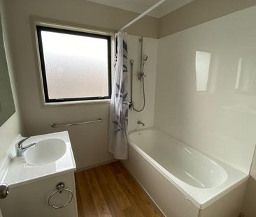 Modern Four-Bedroom Family Home! - Photo 6