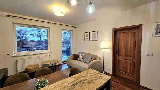 Nowoczesne mieszkanie z garażem, blisko SKM i PKP 43 m² - Zdjęcie 1