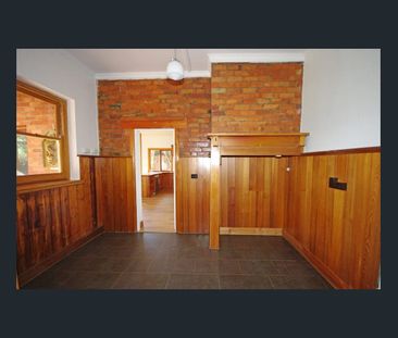 Spacious Family Home with Art Deco Charm in Prime Location - Photo 1