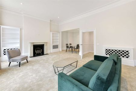 A generously proportioned one bedroom apartment with high ceilings. - Photo 4