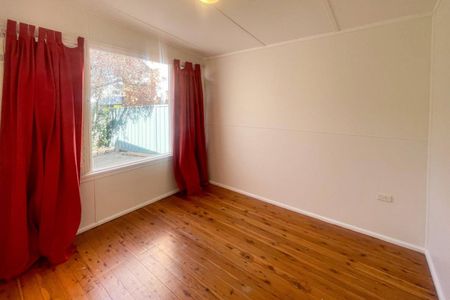 Cozy 2-Bedroom Home with Large Backyard & Covered Deck! - Photo 4