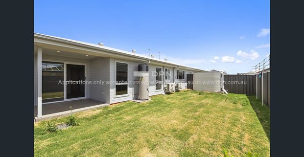 Brand New Three Bedroom Duplex! - Photo 1
