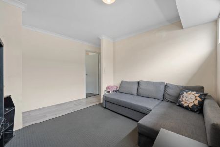 Modern, low-maintenance living opposite the park. - Photo 2
