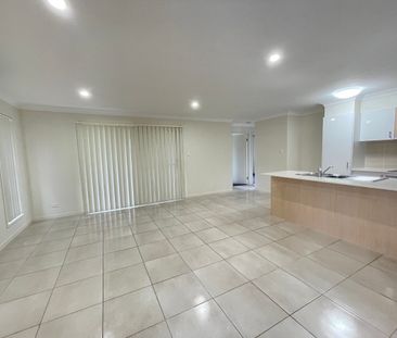 Well Positioned Home Opposite Parkland And Only A Short Walk To School - Photo 2