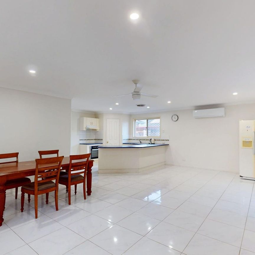 Bright, Comfortable and Affordable Family Home in a Great Location! - Photo 1