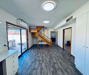 Spacious Two-Story Family Home with Modern Comforts and Prime Location - Photo 1