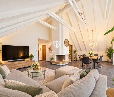 Grosszügige 4.5-Zimmer-Dachwohnung mit Cheminée und zwei Balkonen i... - Foto 1