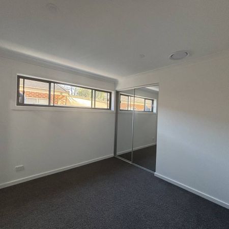 Stylish & Spacious Townhouse Living in a Prime Location - Photo 3