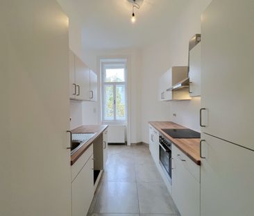 Sanierte 2-Zimmer-Altbauwohnung mit Mini-Balkon - Photo 6