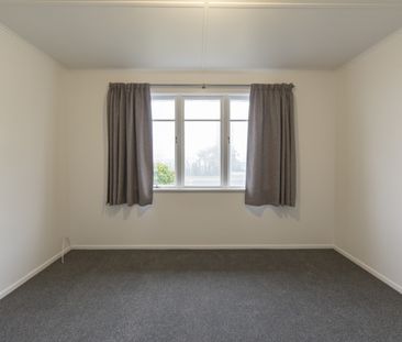 Beautifully Renovated Family Home with Huge Four Car Garage - Photo 2