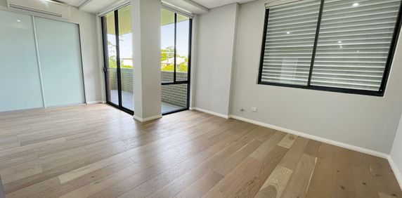 Modern two bedroom unit - 20% below market rent - Photo 2