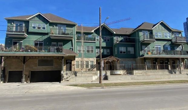 Cozy 2-Bedroom Condo with Underground Parking in Victoria Park - Photo 1