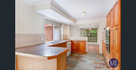 Perfect Family Living on the High Side—Walk to Buses & CTHS - Photo 2