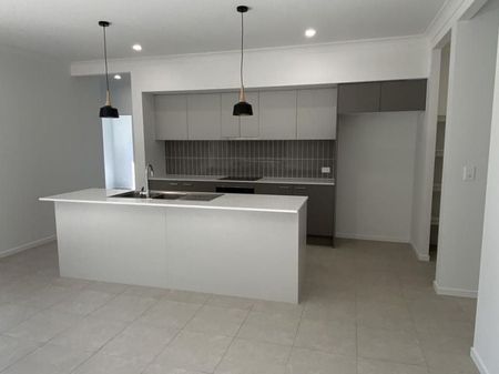 Brand New family home in an elevated position with views of the lush green treelined surrounds. It is ready for you to move in and make your home! - Photo 3