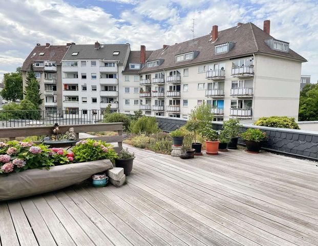 Stadtleben trifft Wohlfühlambiente – Stilvolle Wohnung mit Sonnenterrasse & hochwertiger Einbauküche - Photo 1