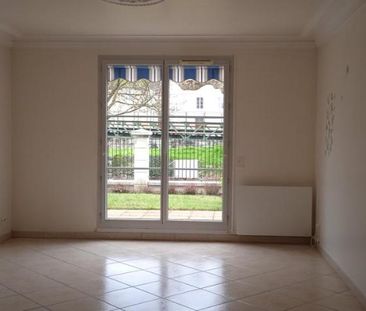 APPARTEMENT DE STANDING AVEC JARDIN T3 77 m2 - Photo 4