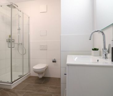 Moderne 1.5 Zimmer-Wohnung an zentraler Lage - Photo 6