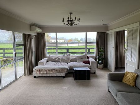 Situated in the desirable Cambridge and positioned perfectly over looking the Milan Park horse stud sits this immaculately presented four bedroom family home. - Photo 3